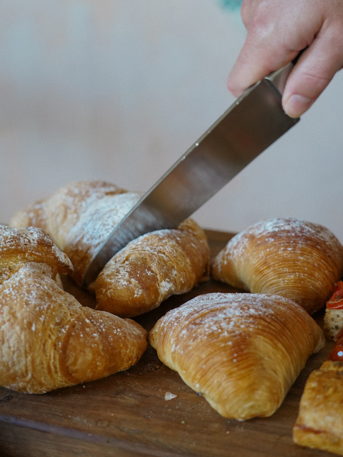 Croissants being cut
