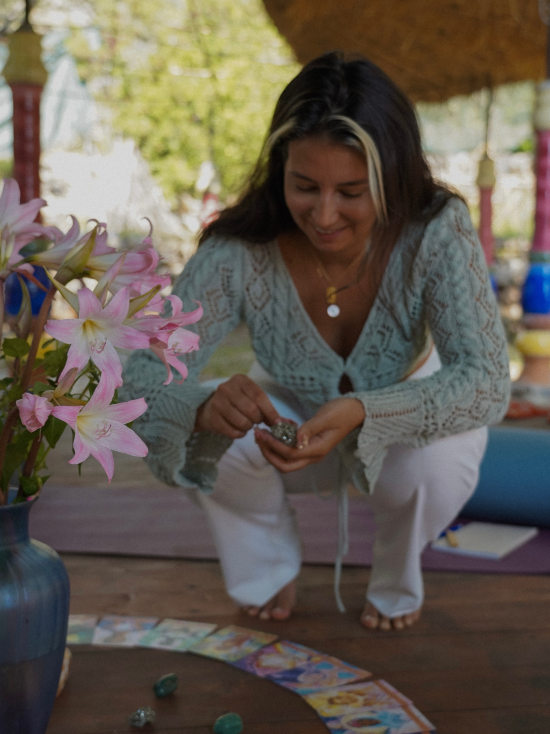 Woman with crystals and tarot cards
